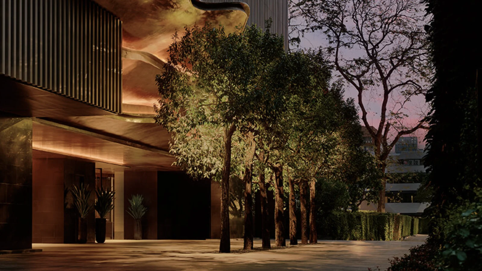 Illuminated exterior entrance at Aman Nai Lert Bangkok